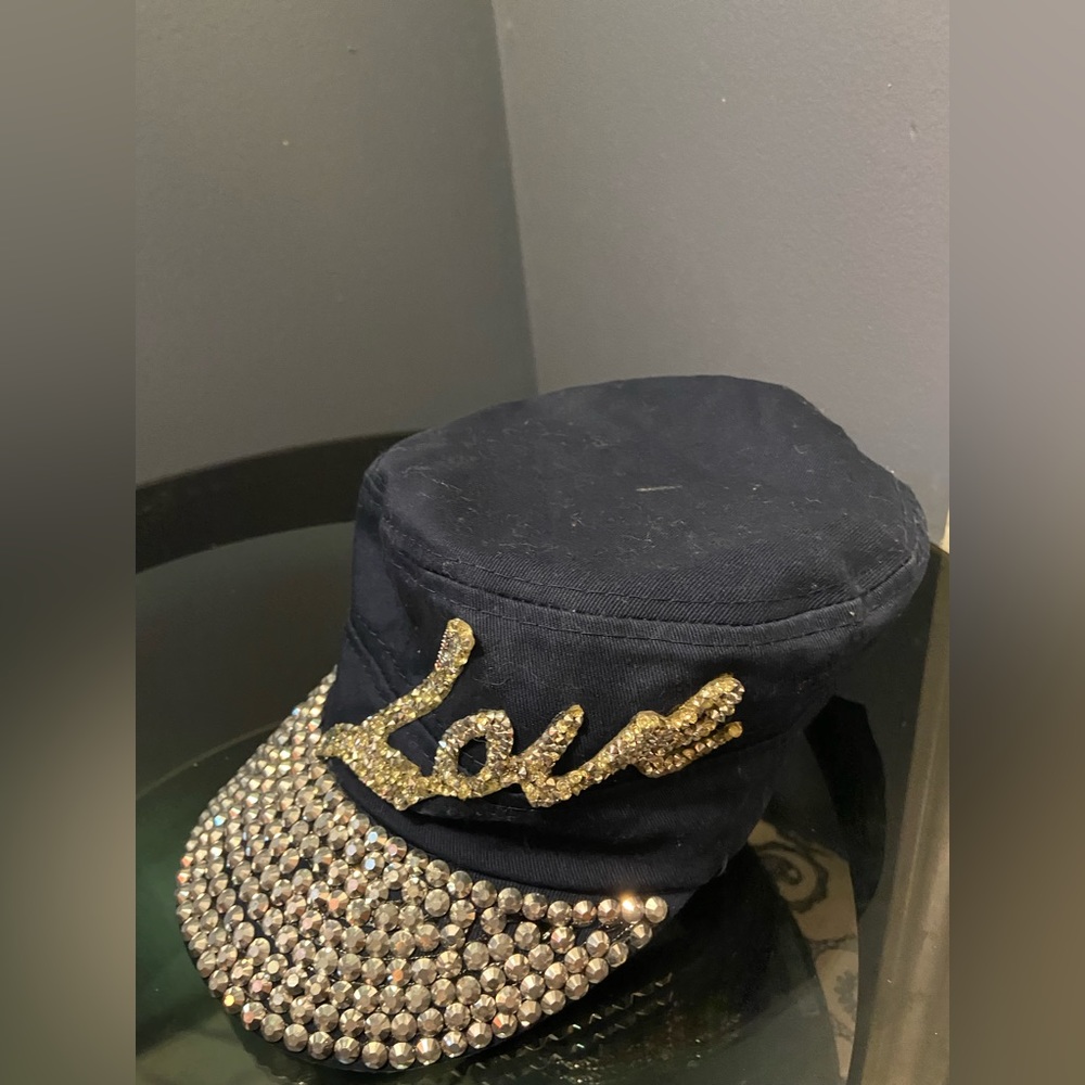 Blue cap for women. with stones in front and the word love with glitter